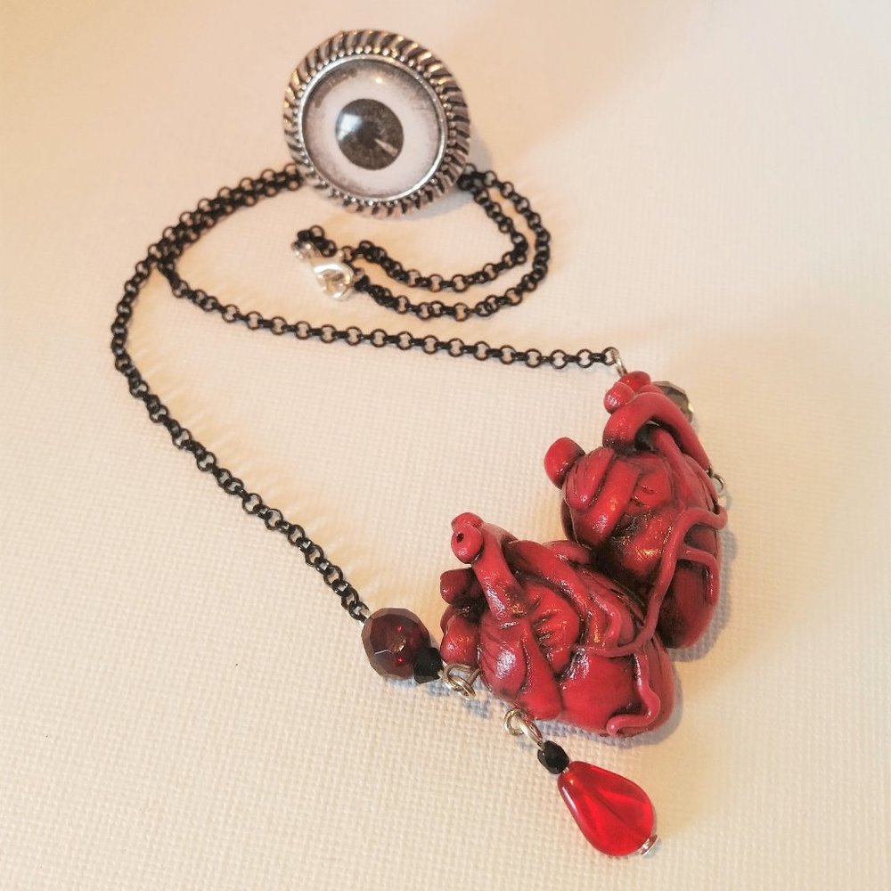 HANDMADE Flesh and blood siamese hearts necklace